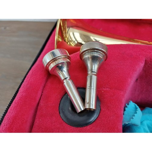 646 - A cased John Packer Ltd JP271SW B♭ Cornet with Denis Wick size 2 silver plated and John Packer mouth... 