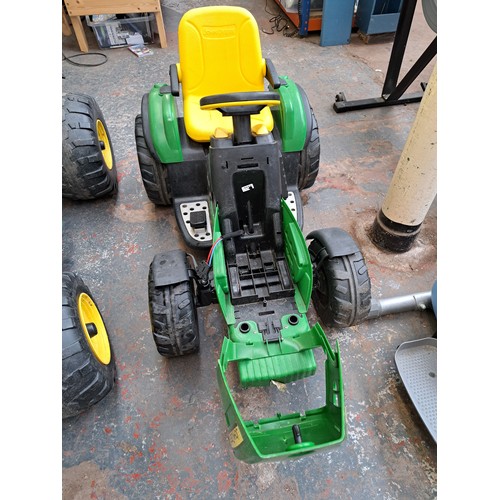 754 - A John Deere Ground Force electric ride on tractor