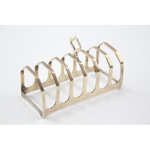 2256 - A Viners hallmarked Sheffield sterling silver toast rack, dated 1933 - approx. gross weight 75g and ... 