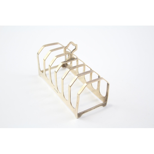 2256 - A Viners hallmarked Sheffield sterling silver toast rack, dated 1933 - approx. gross weight 75g and ... 