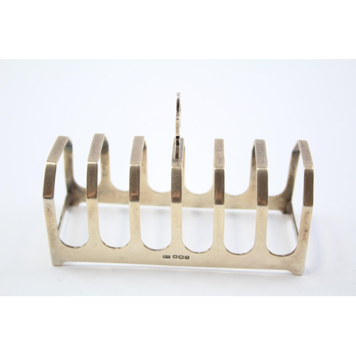 2256 - A Viners hallmarked Sheffield sterling silver toast rack, dated 1933 - approx. gross weight 75g and ... 