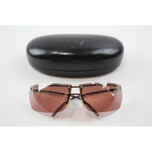 2333 - A cased pair of Gucci frameless sunglasses