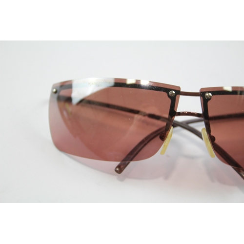 2333 - A cased pair of Gucci frameless sunglasses