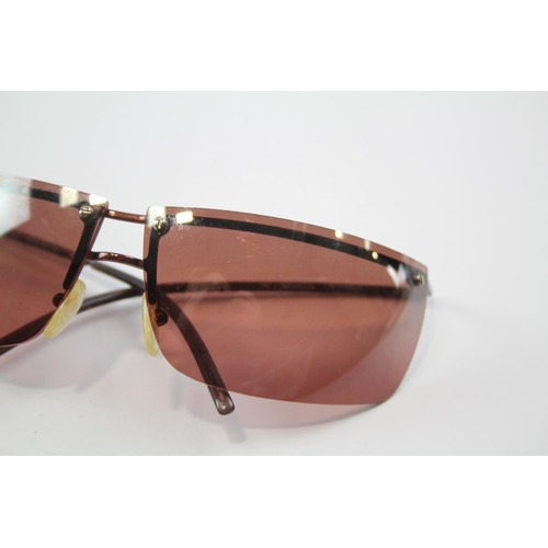 2333 - A cased pair of Gucci frameless sunglasses