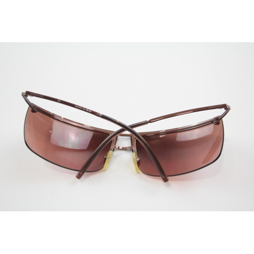 2333 - A cased pair of Gucci frameless sunglasses