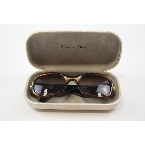 2334 - A cased pair of Christian Dior sunglasses