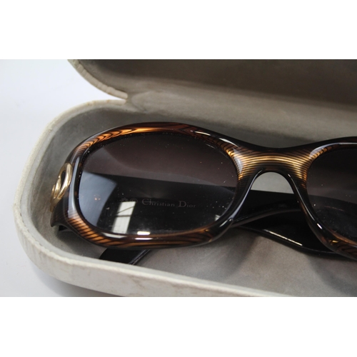 2334 - A cased pair of Christian Dior sunglasses