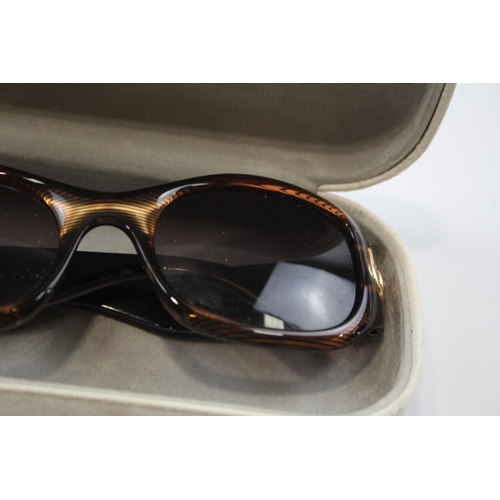 2334 - A cased pair of Christian Dior sunglasses