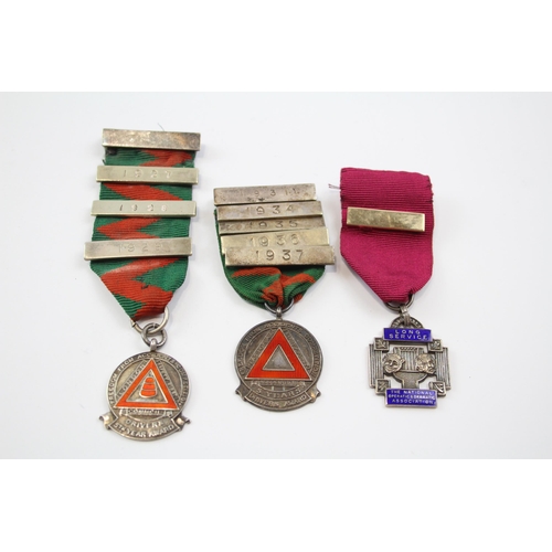 2343 - Three hallmarked sterling silver medals to include two Drivers Awards etc. - approx. gross weight 65... 