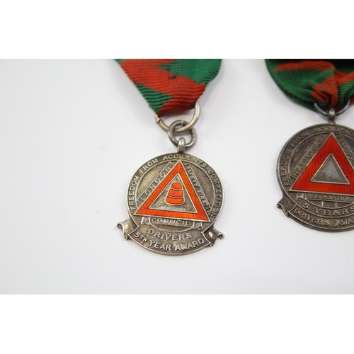 2343 - Three hallmarked sterling silver medals to include two Drivers Awards etc. - approx. gross weight 65... 