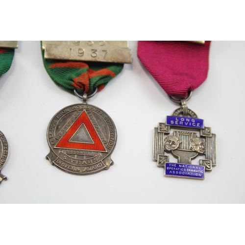 2343 - Three hallmarked sterling silver medals to include two Drivers Awards etc. - approx. gross weight 65... 