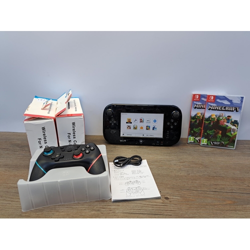 A Nintendo Wii U gamepad with three third-party wireless
