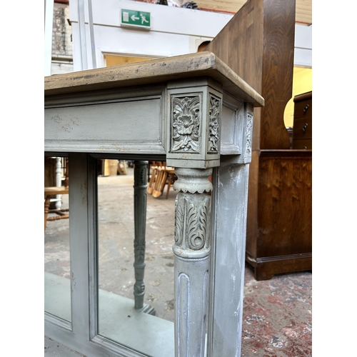 107 - A 19th century style grey painted and hardwood mirror back console table with neoclassical style sup... 