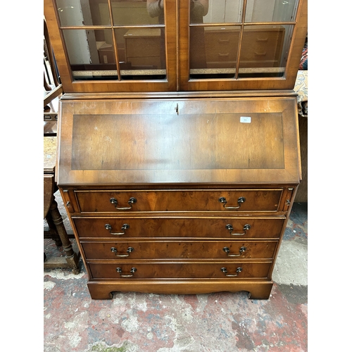 111 - A Georgian style yew wood bureau bookcase - approx. 204cm high x 91cm wide x 47cm deep