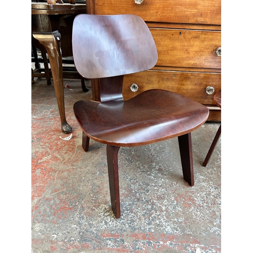 116 - A pair of Eames DCW style plywood chairs