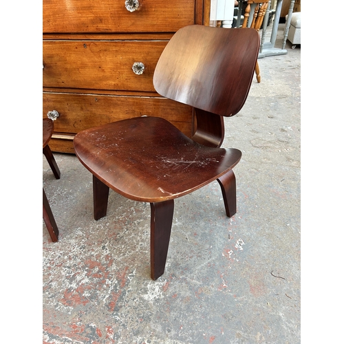 116 - A pair of Eames DCW style plywood chairs