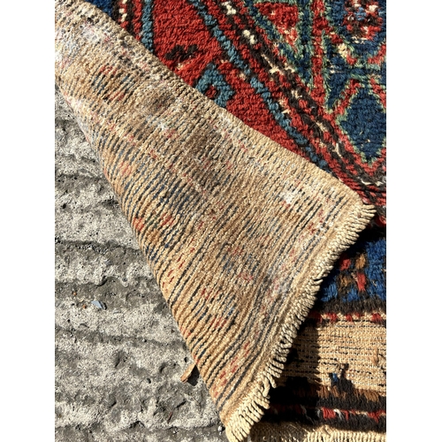 121 - A Persian hand knotted hall runner - approx. 285cm x 77cm