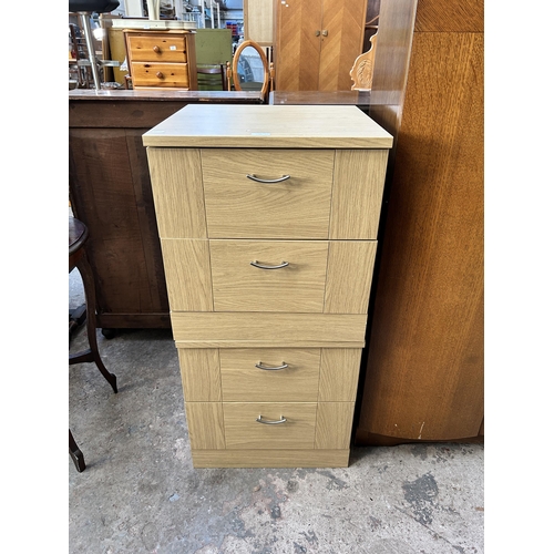 13 - A pair of modern oak effect bedside chests of drawers