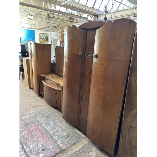 14 - A mid 20th century Lebus oak three piece bedroom suite