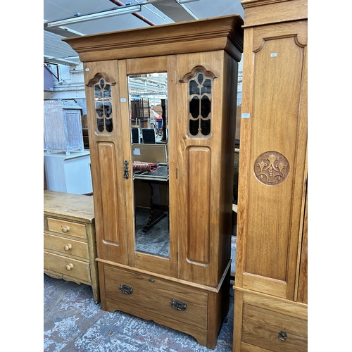 141 - An Edwardian satinwood mirror door wardrobe - approx. 195cm high x 107cm wide x 48cm deep