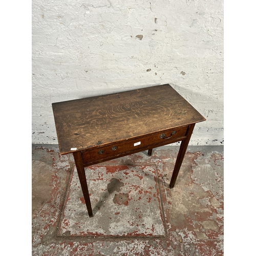 150 - A Georgian oak single drawer side table - approx. 72cm high x 79cm wide x 42cm deep