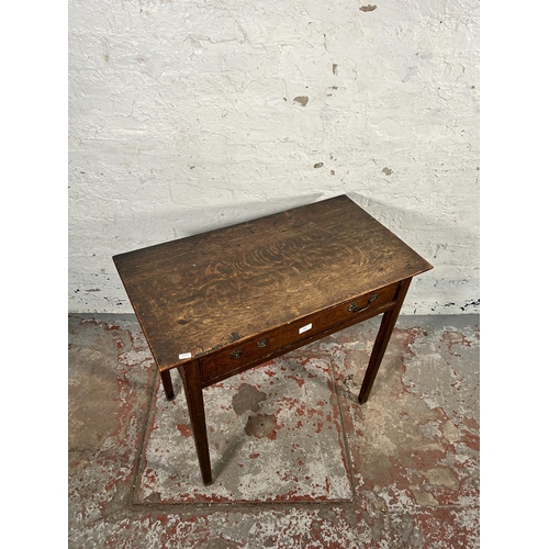 150 - A Georgian oak single drawer side table - approx. 72cm high x 79cm wide x 42cm deep