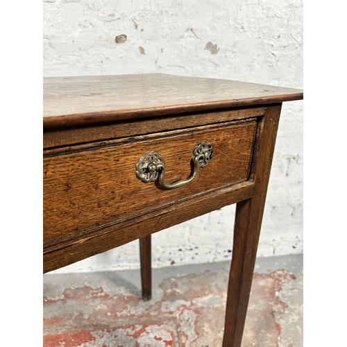 150 - A Georgian oak single drawer side table - approx. 72cm high x 79cm wide x 42cm deep