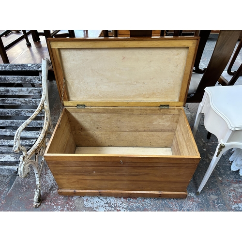 162 - A Victorian pine blanket box with later added plywood lid and base