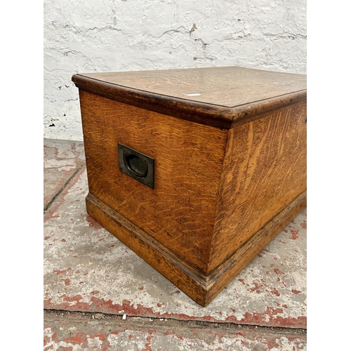 18 - A Victorian oak blanket box with brass handles - approx. 35cm high x 63cm wide x 39cm deep