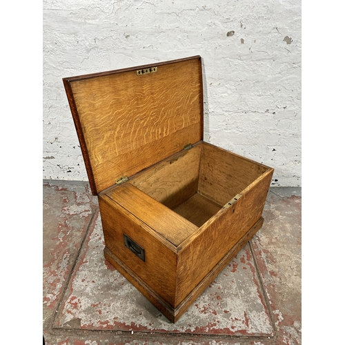 18 - A Victorian oak blanket box with brass handles - approx. 35cm high x 63cm wide x 39cm deep