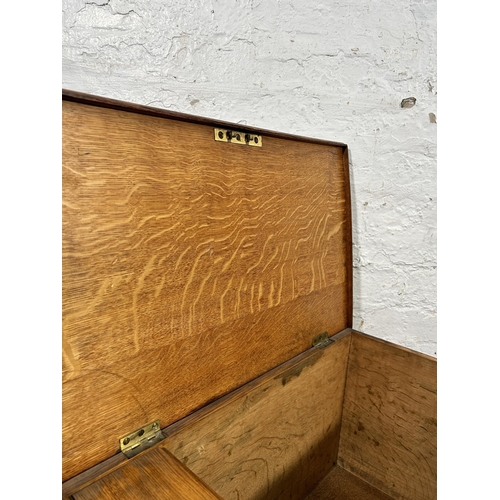 18 - A Victorian oak blanket box with brass handles - approx. 35cm high x 63cm wide x 39cm deep