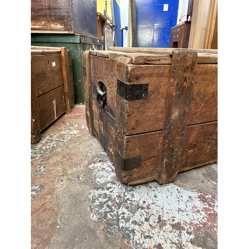 24 - A late 19th/early 20th century pine and metal banded shipping crate - approx. 42cm high x 76cm wide ... 