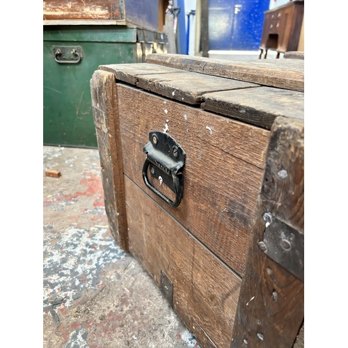 25 - A late 19th/early 20th century pine and metal banded shipping crate - approx. 42cm high x 76cm wide ... 