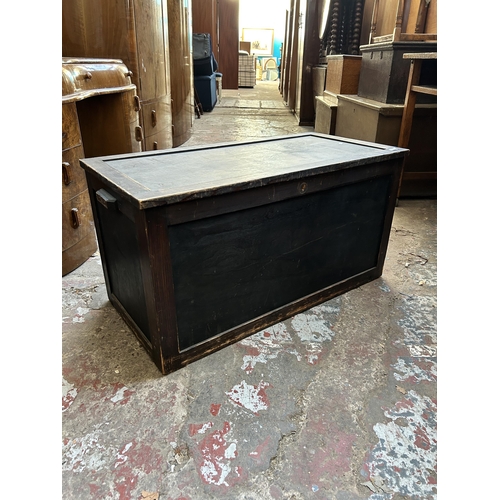 26 - A mid 20th century stained plywood blanket box - approx. 48cm high x 93cm wide x 46cm deep