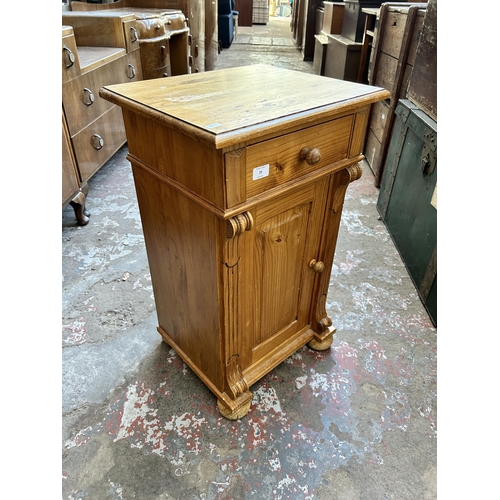 29 - A Victorian style carved pine bedside cabinet