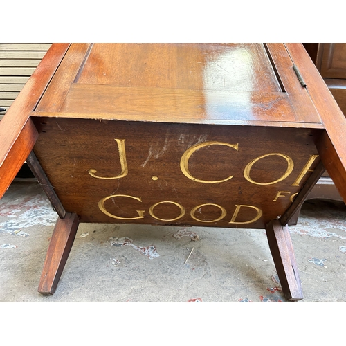 34 - An Edwardian mahogany music cabinet