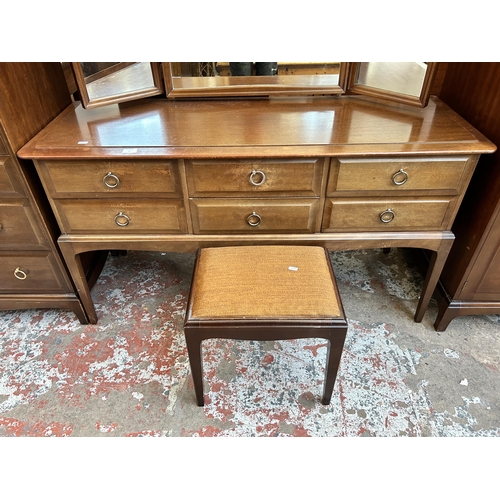 37 - A Stag Minstrel mahogany dressing table and stool