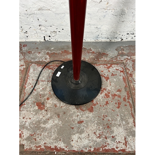 42 - An 1980s red and black painted wooden standard lamp attributed to Heal's - approx. 140cm high