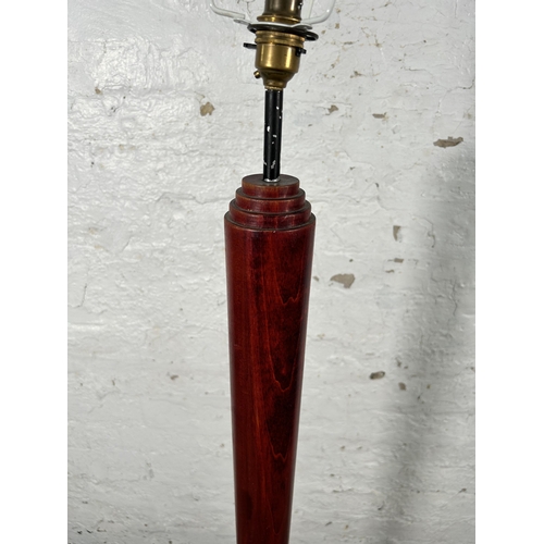 42 - An 1980s red and black painted wooden standard lamp attributed to Heal's - approx. 140cm high