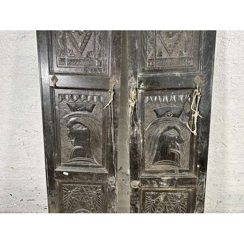 50 - A pair of carved oak panels - approx. 161cm high x 36cm wide