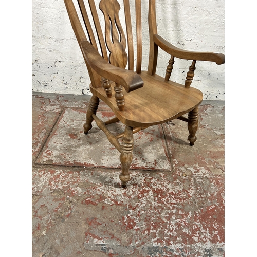 51 - A Victorian elm and beech grandfather chair