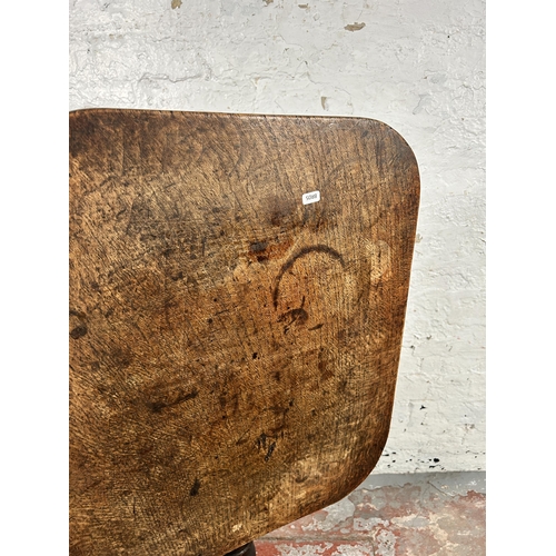 54 - A Georgian oak tilt top tripod occasional table - approx. 106cm high when tilted