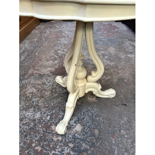 57 - A 19th century white painted serpentine tripod occasional table