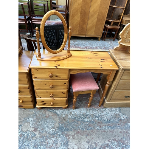 58 - Three pieces of pine bedroom furniture, bedside chest of drawers, chest of drawers and dressing tabl... 