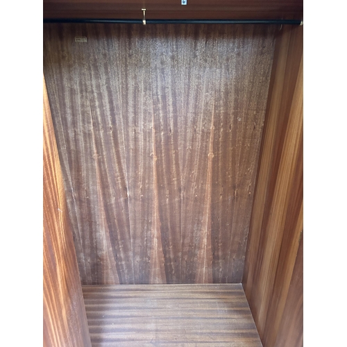 6 - An Austinsuite teak double wardrobe - approx. 174cm high x 121cm wide x 58cm deep