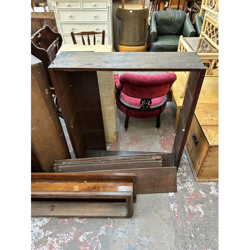 62 - An early 20th century mahogany corner bookcase