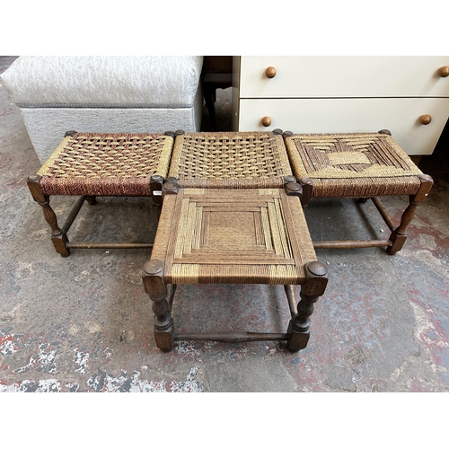 68 - Four oak and rush woven footstools