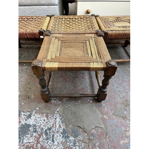 68 - Four oak and rush woven footstools