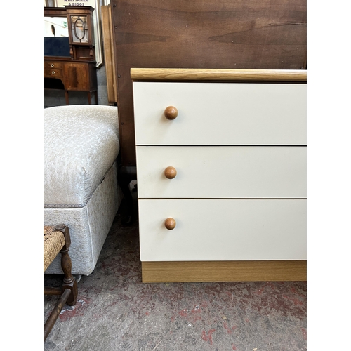 69 - An oak effect and white laminate chest of drawers