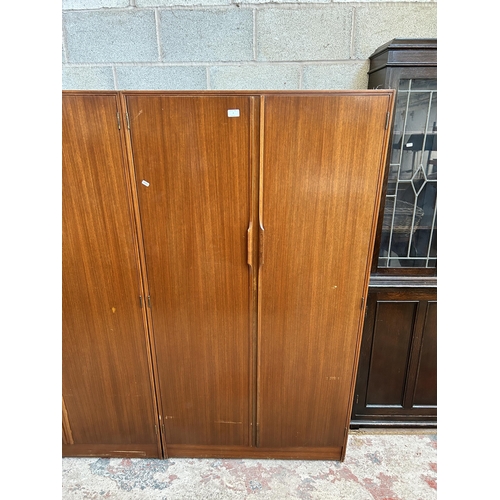 7 - An Austinsuite teak double wardrobe - approx. 174cm high x 92cm wide x 58cm deep